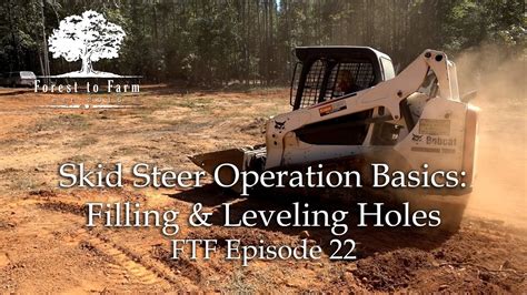 using skid steer to level ground|skid steer hole filling.